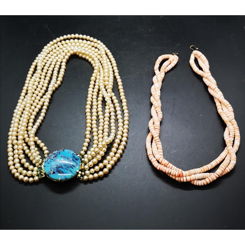 83 - Two vintage necklaces, one coral and one simulated pearl with ceramic pendant