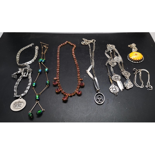 85 - A collection of assorted costume jewellery to include two silver bracelets