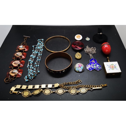 86 - A collection of vintage and enamel costume jewellery to include sterling silver necklace with blue e... 