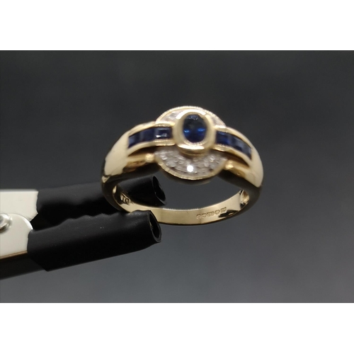 89 - A hallmarked 14ct gold sapphire and diamond ring with one central sapphire, six outer sapphires and ... 