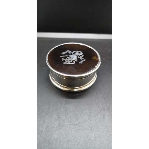 9 - A hallmarked London silver circular snuff box with tortoise shell lid, dated 1919 - approx. gross we... 