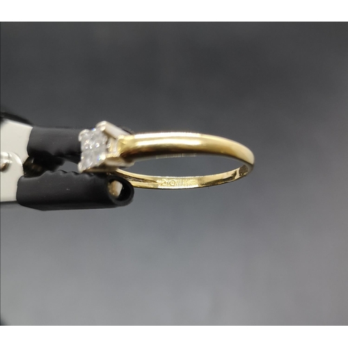 91 - A hallmarked 18ct gold diamond ring with four diamonds, size P ½ - approx. gross weight 2.57 grams