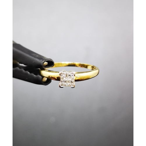 91 - A hallmarked 18ct gold diamond ring with four diamonds, size P ½ - approx. gross weight 2.57 grams