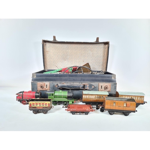 454 - A large collection of Hornby 0 gauge model railway to include type 501 locomotive, locomotive in red... 