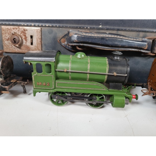 454 - A large collection of Hornby 0 gauge model railway to include type 501 locomotive, locomotive in red... 