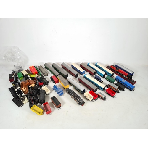 459 - A box containing a large quantity of model railway accessories to include passenger coaches, fuel ta... 