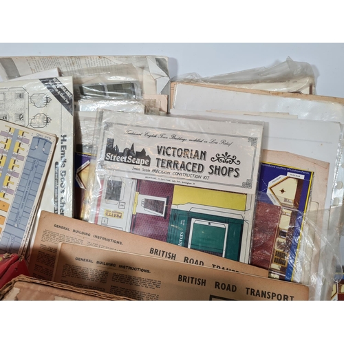 461 - A box containing a large quantity of model railway accessories to include build your own Victorian t... 