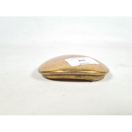 262 - A 19th century brass curved snuff box - approx. 9.5cm x 7cm