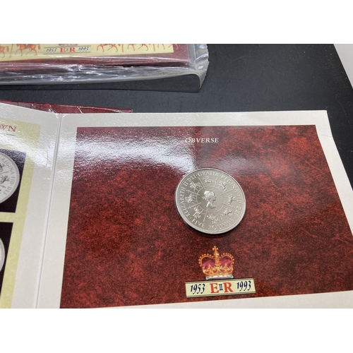 195 - Three Royal Mint issue envelopes containing Elizabeth II 40th Anniversary Coronation crown coins