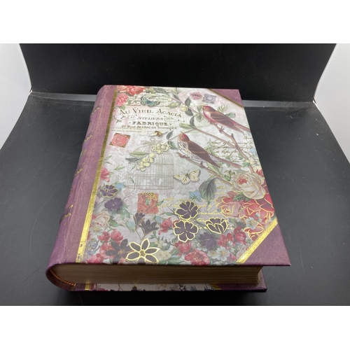 236 - A French 'Au Vieil Acacia' book jewellery box containing assorted Victorian marbles