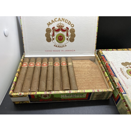 256 - Two boxes of Macanudo Jamaica cigars, one box complete with 25 and the other box contains 20