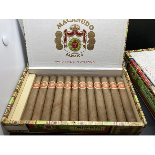 256 - Two boxes of Macanudo Jamaica cigars, one box complete with 25 and the other box contains 20