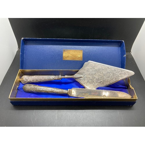 30 - Two items, one silver plate cake server with hallmarked Sheffield silver handle dated 1967 and one E... 