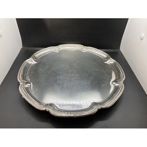 2 - A hallmarked Sheffield silver salver with scalloped edge and tri-footed base by Gladwin Ltd, dated 1... 