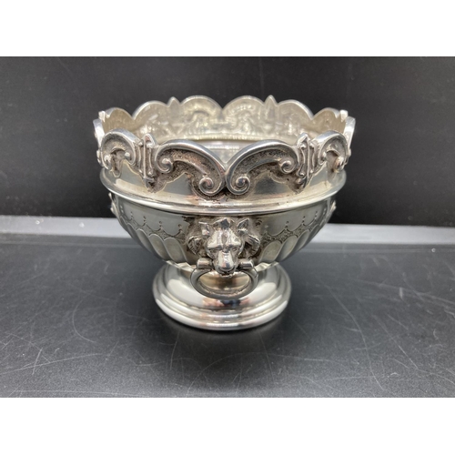 4 - A hallmarked Birmingham silver miniature bowl with lion mask ring handles and acanthus leaf design b... 