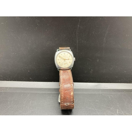 63 - A vintage Tempex Swiss made wristwatch with brown leather strap