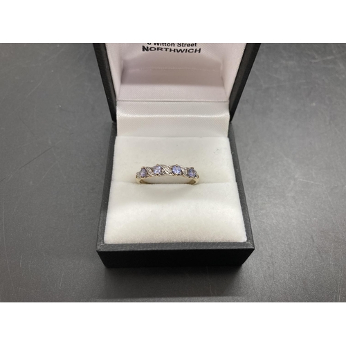 90 - Two items, one hallmarked 9ct gold tanzanite and diamond ring, size Q - approx. gross weight 1.46 gr... 