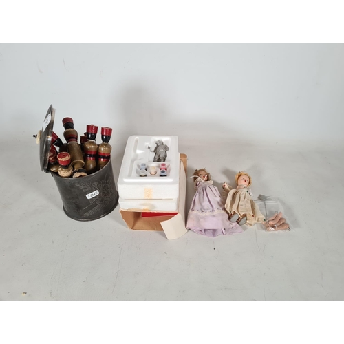 475 - Four items to include two vintage articulated painted dolls, set of wooden French skittles and a pew... 