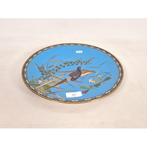 386 - A cloisonné wall charger with stylized bird design - approx. 31cm diameter