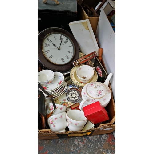 1568 - Three boxes containing glassware, pictures, ceramics, wall clock etc.