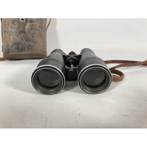 59 - A pair of pre WWI German Busch binoculars with case - as used by Naval officers