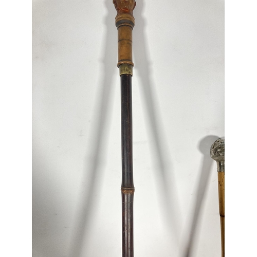 61 - Two items, one Kings Shropshire light infantry swagger stick and one bamboo 12