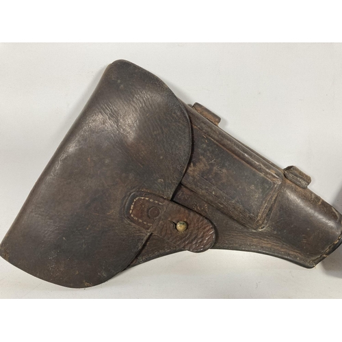 67 - A WWII Browning pistol holster with magazine and cleaning rod