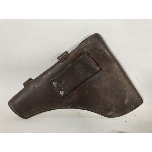 67 - A WWII Browning pistol holster with magazine and cleaning rod