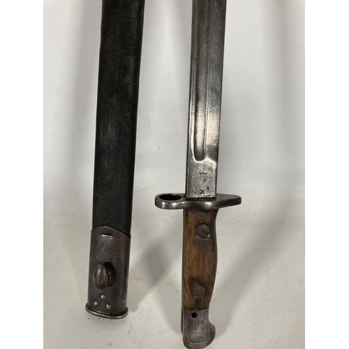 82 - A WWI Pattern 1907 British SMLE bayonet and scabbard - blade approx. 43cm long