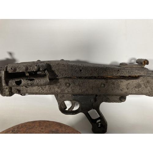 85 - A WWII German MG42 machine gun relic and helmet, found together on the Eastern Front in the area of ... 