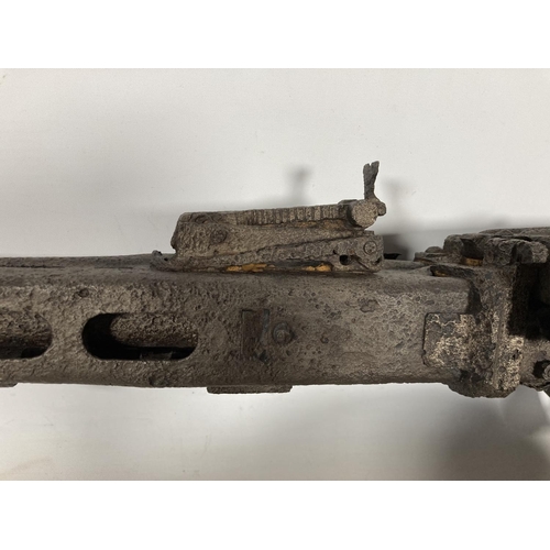 85 - A WWII German MG42 machine gun relic and helmet, found together on the Eastern Front in the area of ... 