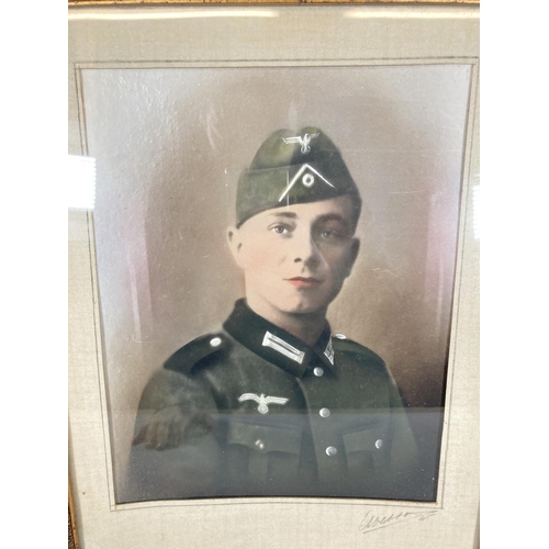 88 - A framed photograph of a WWII German soldier - approx. 44cm x 34cm with frame