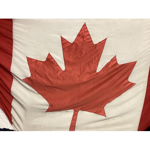 95 - A large Canadian flag - approx. 222cm x 117cm