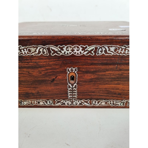 161 - An 19th century rosewood workbox with mother of pearl inlay - approx. 12cm high x 30cm wide x 23cm d... 