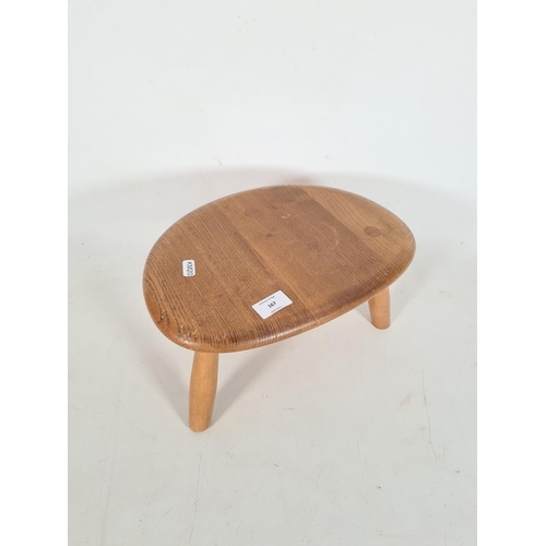 167 - A mid 20th century Ercol blonde elm pebble nesting table - approx. 18cm high x 34cm wide x 25cm deep