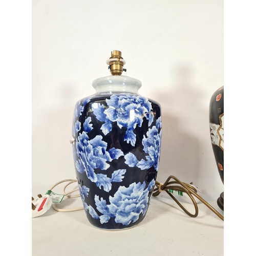 176 - Two ceramic table lamps, one hand painted oriental style with bird design - approx. 44cm high and on... 