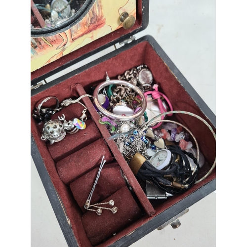 207 - A jewellery box containing a collection of costume jewellery