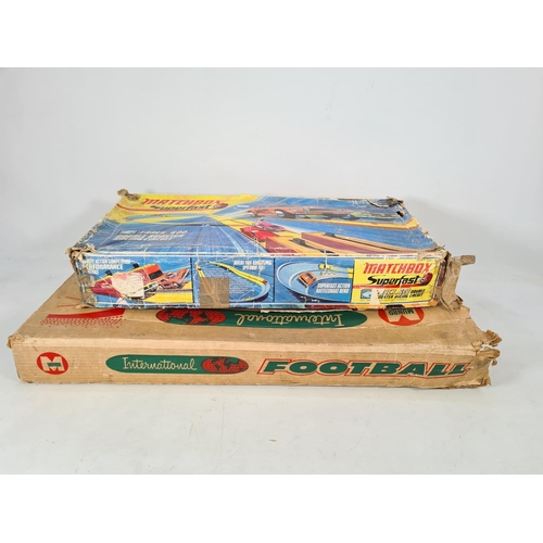 219 - Two items, one boxed Matchbox Superfast Track.600 double booster racing circuit and one boxed Munro ... 