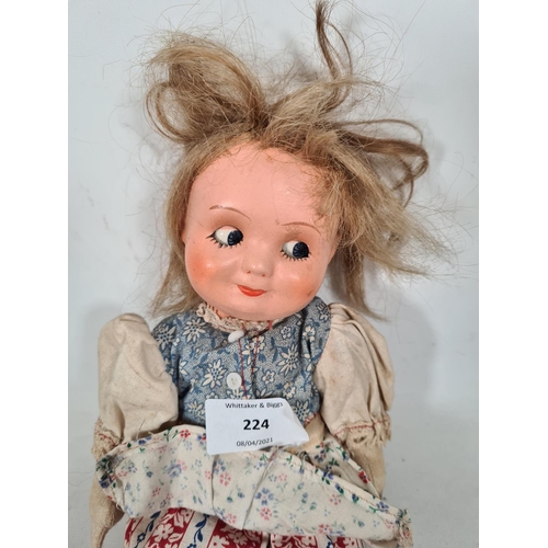 224 - Three items, one articulated hand painted doll with impressed 2HP to neck, one Armand Marseille bisq... 