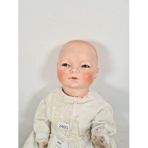 225 - An early 20th century German Schoenau & Hoffmeister bisque headed articulated doll with impressed ma... 