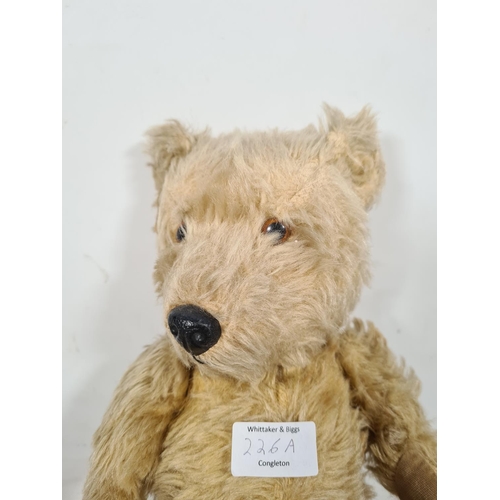 226A - A mid 20th century Chiltern articulated bear - approx. 34cm high x 24cm wide