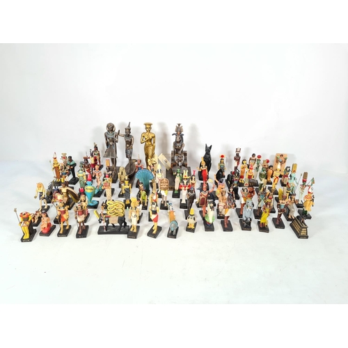 229 - A box containing a collection of hand painted Egyptian figurines