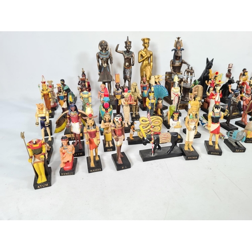 229 - A box containing a collection of hand painted Egyptian figurines