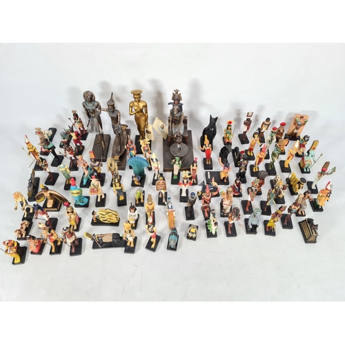 229 - A box containing a collection of hand painted Egyptian figurines