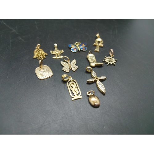 111 - Eleven various necklace pendants, four 9ct gold - combined gross weight 5.25 grams, two 14ct includi... 