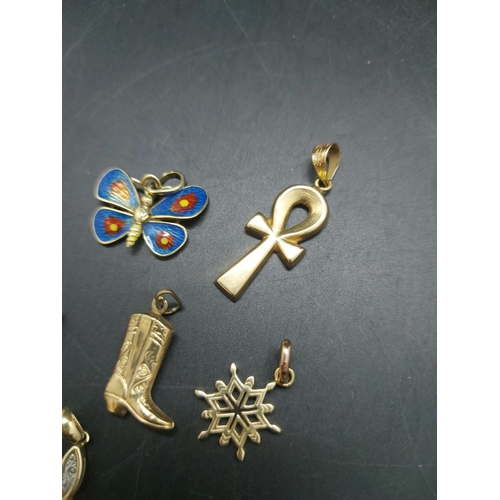 111 - Eleven various necklace pendants, four 9ct gold - combined gross weight 5.25 grams, two 14ct includi... 