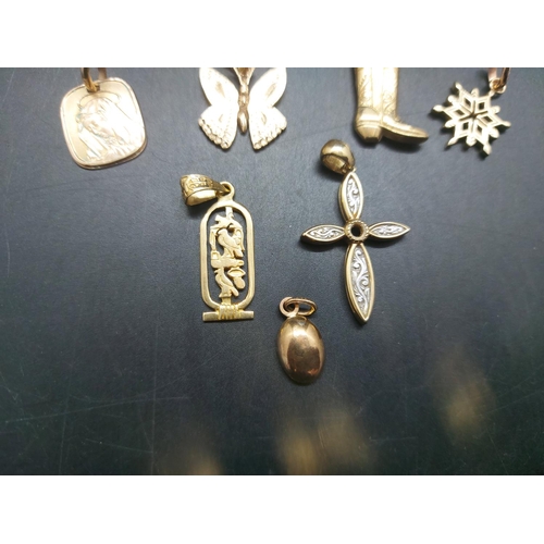 111 - Eleven various necklace pendants, four 9ct gold - combined gross weight 5.25 grams, two 14ct includi... 