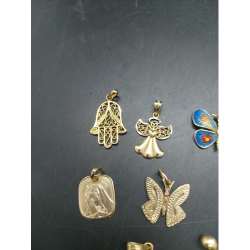 111 - Eleven various necklace pendants, four 9ct gold - combined gross weight 5.25 grams, two 14ct includi... 