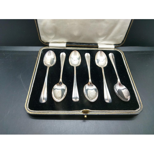 121 - Two items to include a set of six hallmarked Sheffield silver tea spoons by Cooper Brothers & Sons L... 