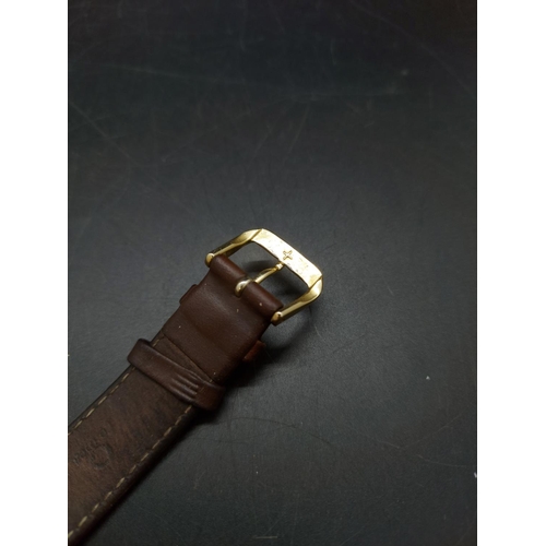 130 - Two items, one Rotary gold plated mens wrist watch with brown leather strap and one hallmarked sterl... 